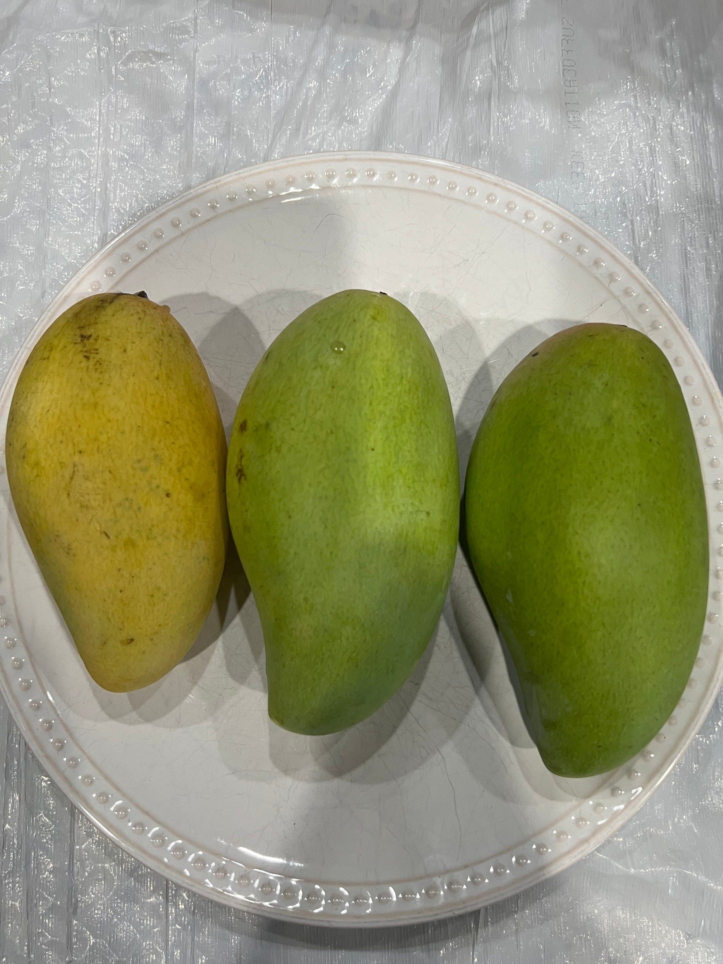 Nam Doc Mai mangos from Caparros Farms — honey-sweet Thai heirloom variety, Pine Island FL